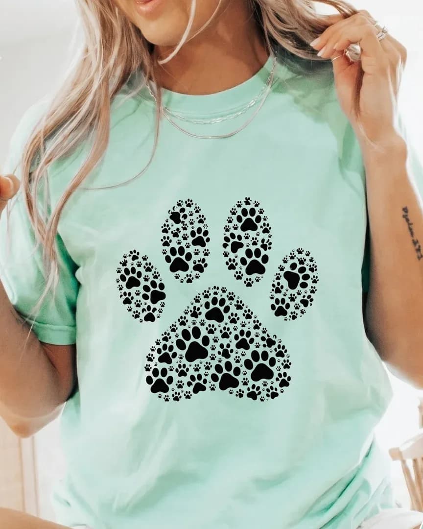 Mint tee with a spotted paw print design